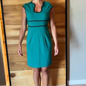 Emerald green and black trimmed cap sleeve dress
